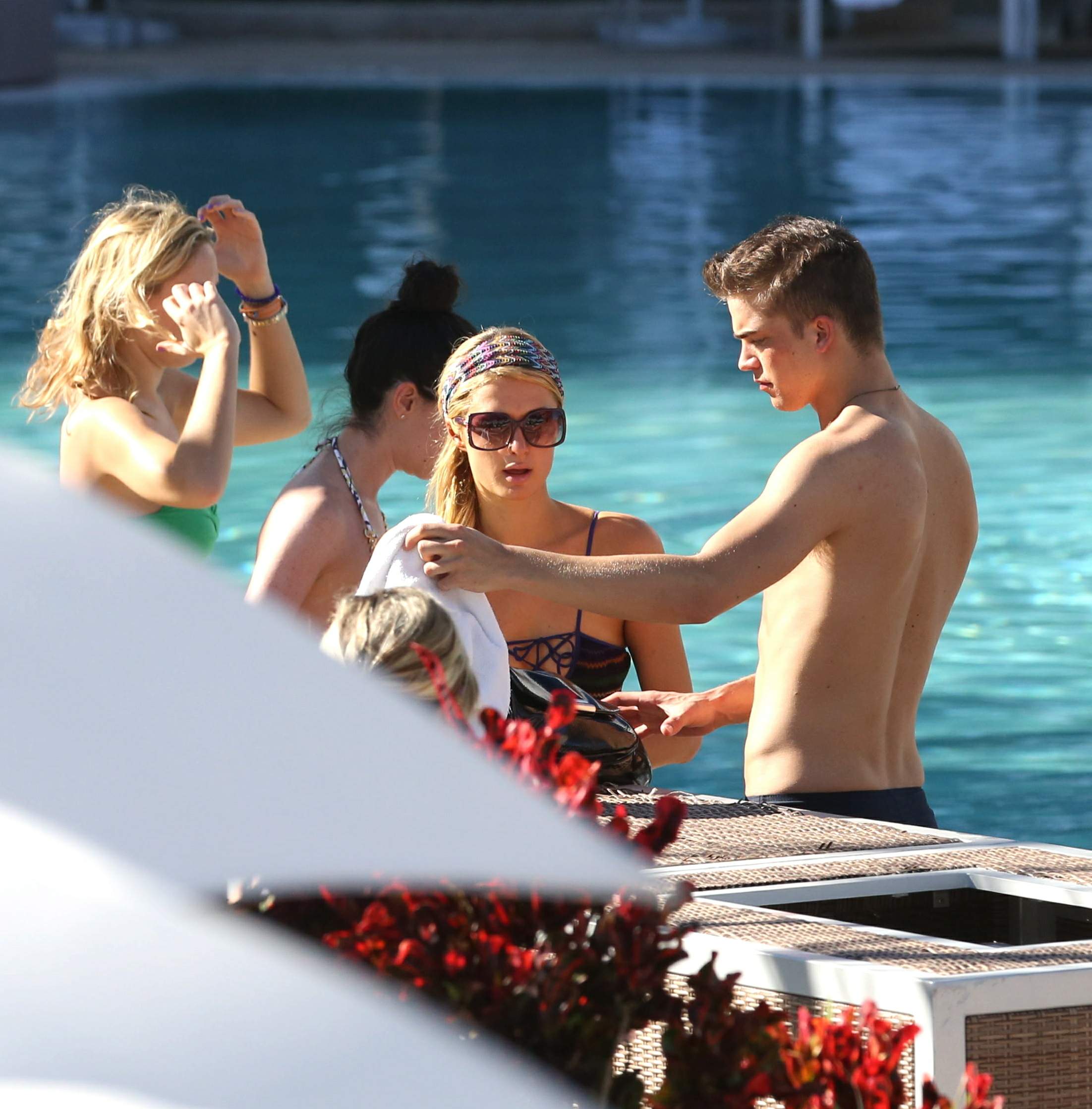 Paris Hilton poolside at their Miami hotel December 7-2012 