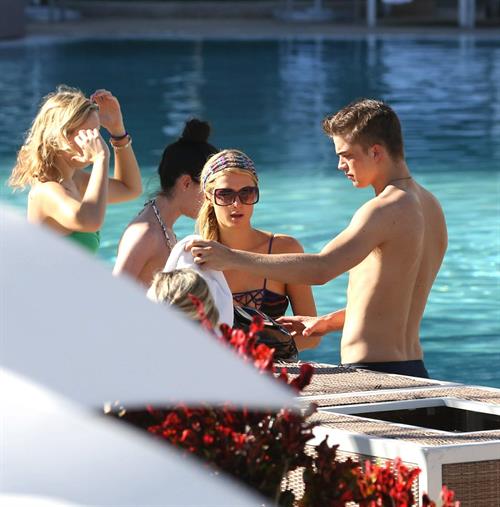 Paris Hilton poolside at their Miami hotel December 7-2012 