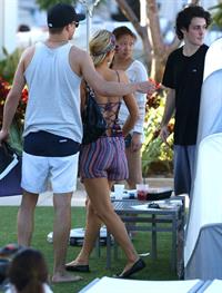 Paris Hilton poolside at their Miami hotel December 7-2012 