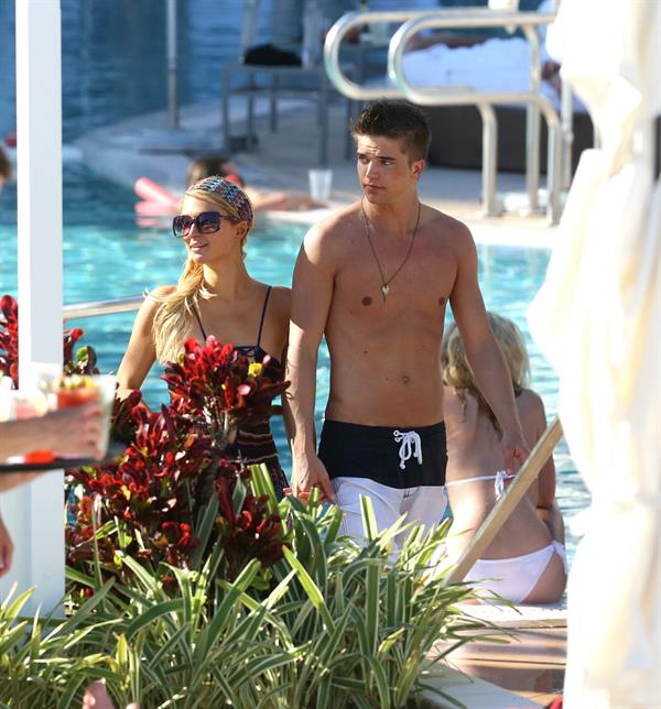 Paris Hilton poolside at their Miami hotel December 7-2012 