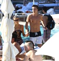 Paris Hilton poolside at their Miami hotel December 7-2012 