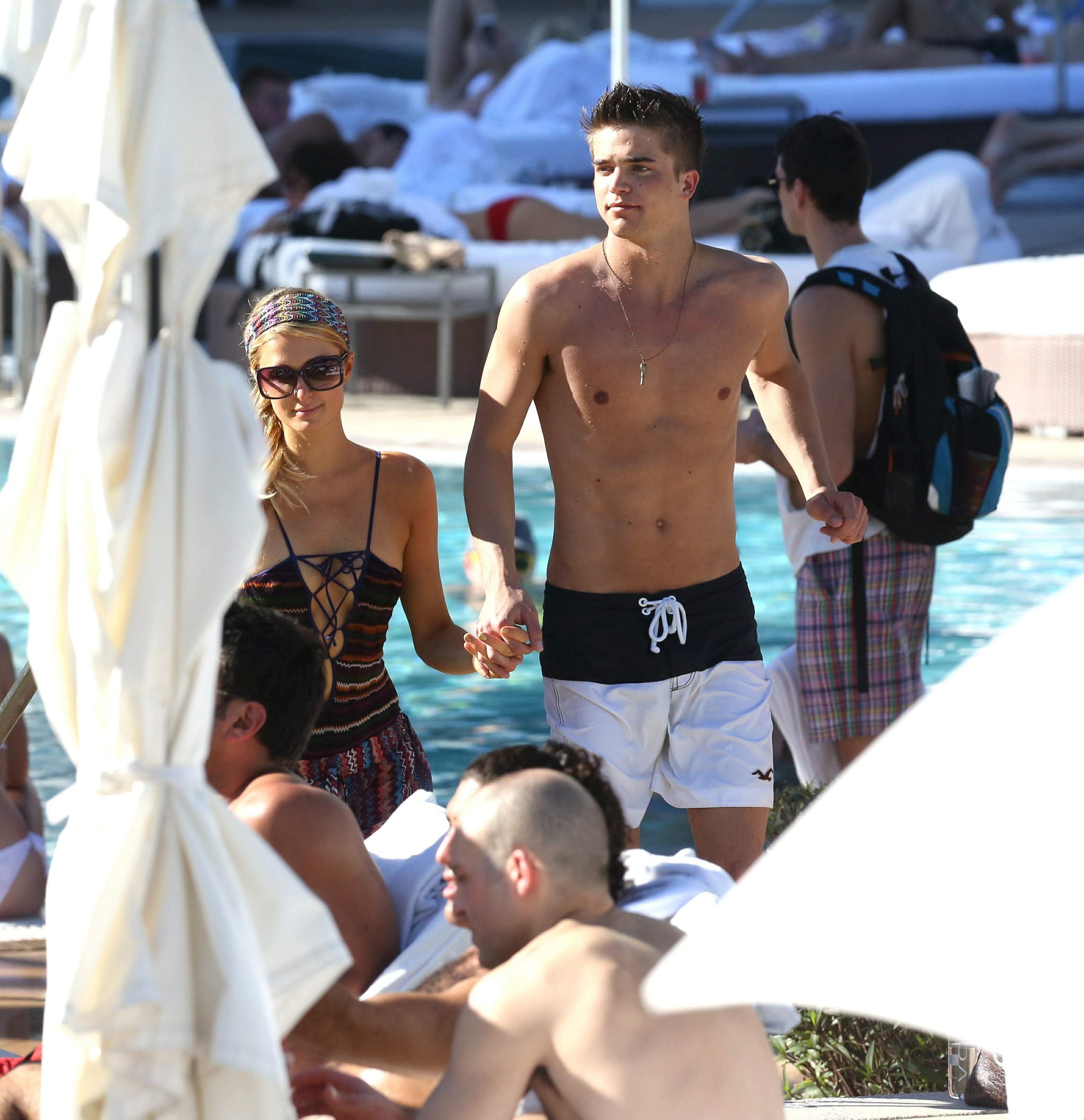 Paris Hilton poolside at their Miami hotel December 7-2012 