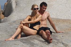 Paris Hilton - Wearing a swimsuit at a beach in France August 6, 2012