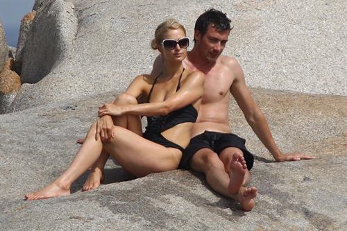 Paris Hilton - Wearing a swimsuit at a beach in France August 6, 2012