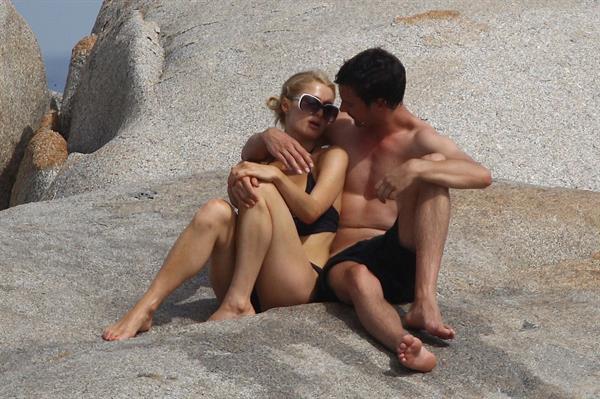 Paris Hilton - Wearing a swimsuit at a beach in France August 6, 2012