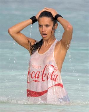 Adriana Lima – beach shoot candids in Cancun 12/2/13 