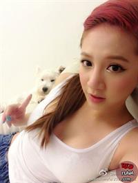 Lin Cai Ti taking a selfie