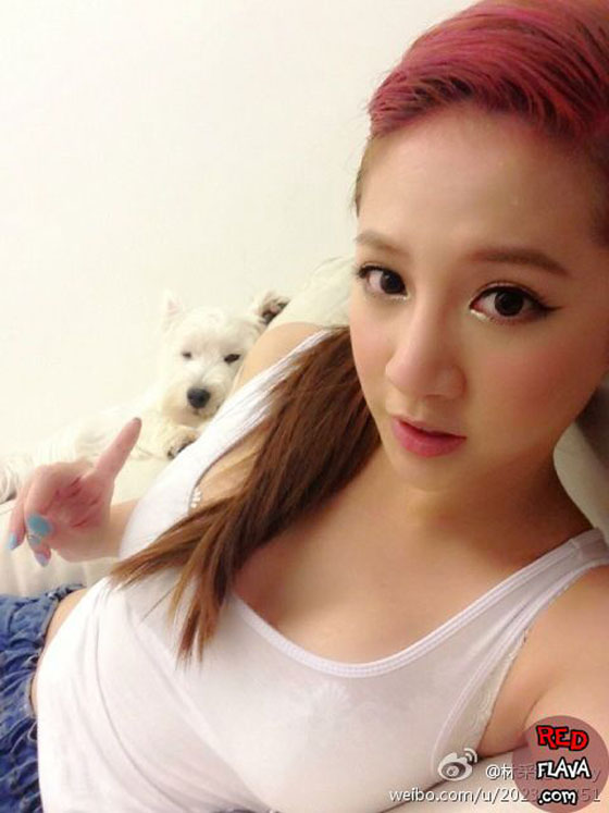 Lin Cai Ti taking a selfie