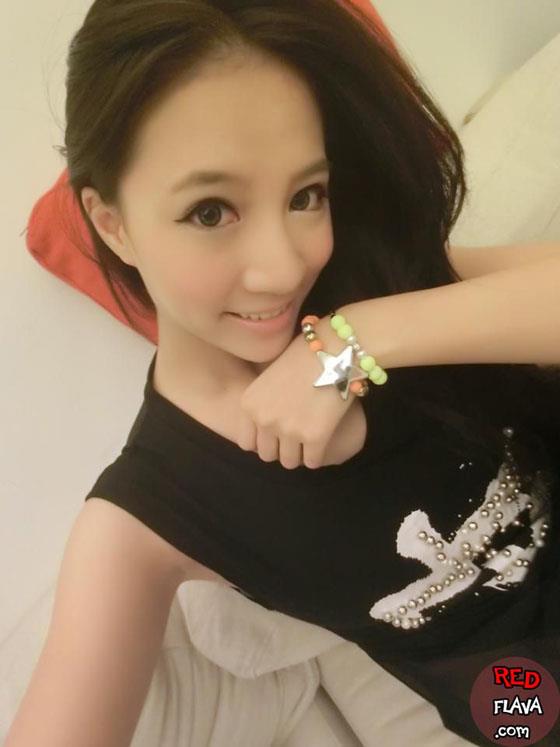 Lin Cai Ti taking a selfie