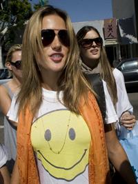 Alessandra Ambrosio Beverly Hills candids in a smiley shirt