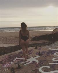 Lindy taking a selfie and - ass