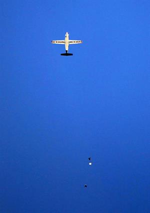 AnnaLynne McCord skydives from 18,000 feet at a charity event, Lompoc August 16, 2014