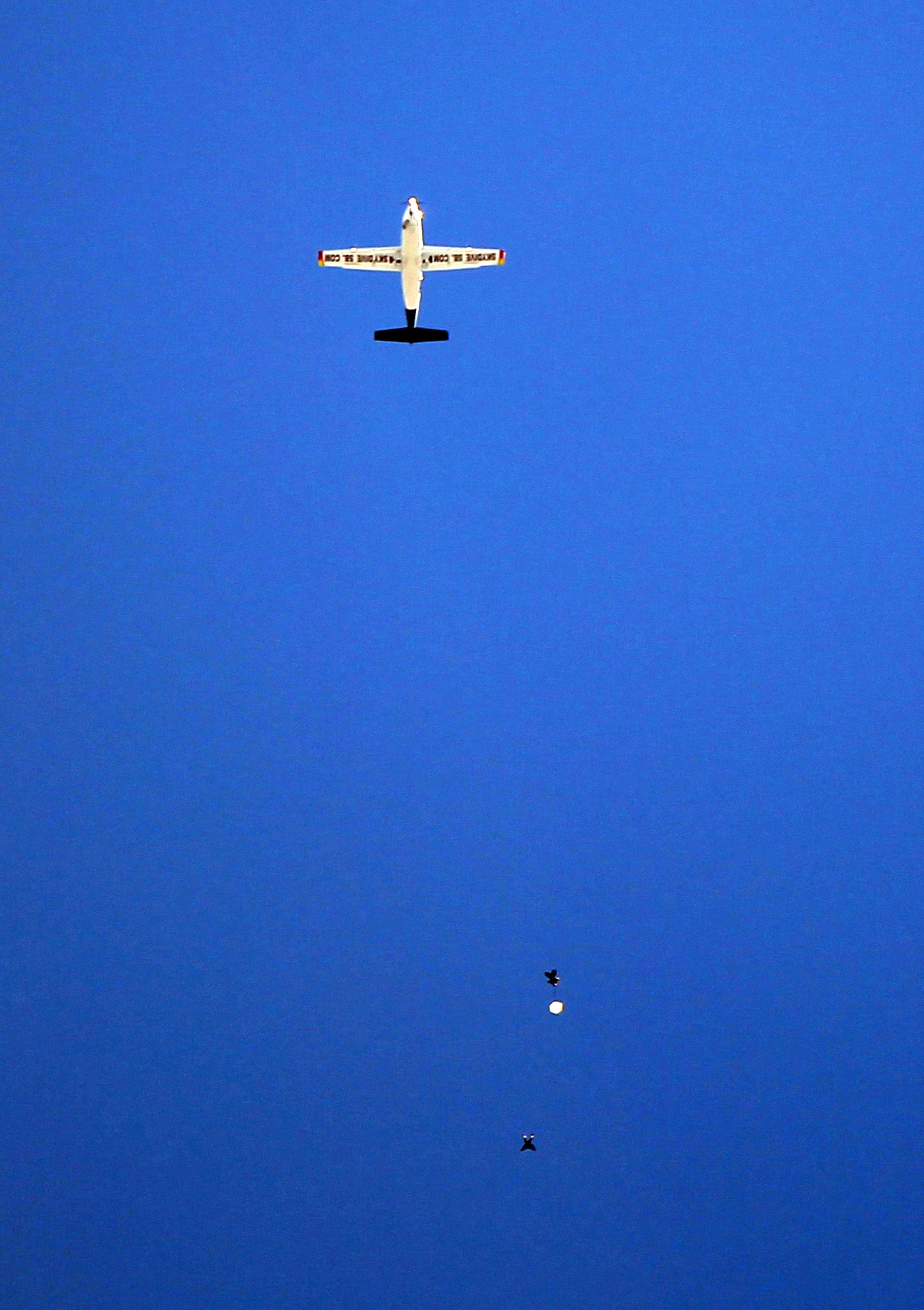 AnnaLynne McCord skydives from 18,000 feet at a charity event, Lompoc August 16, 2014