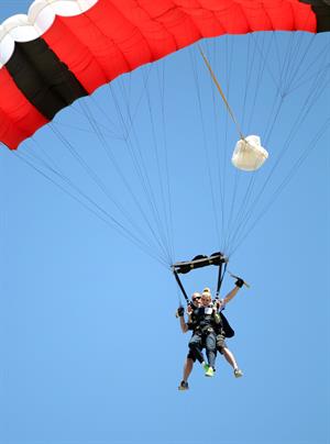 AnnaLynne McCord skydives from 18,000 feet at a charity event, Lompoc August 16, 2014