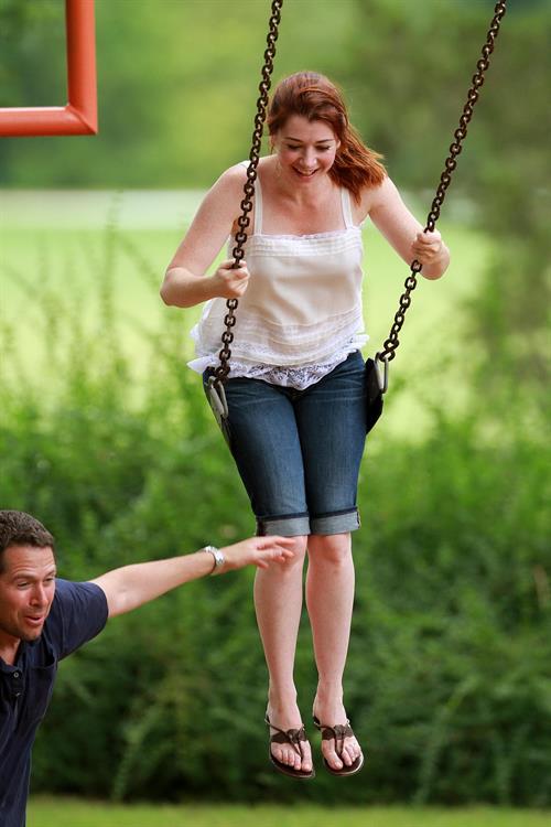 Alyson Hannigan playing in a park in Atlanta July 28, 2011 