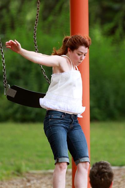 Alyson Hannigan playing in a park in Atlanta July 28, 2011 