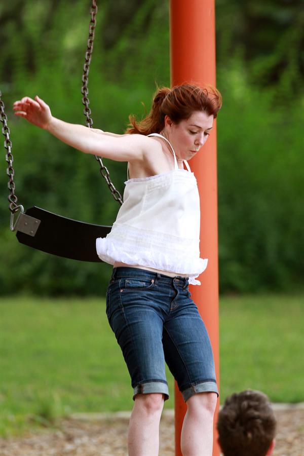 Alyson Hannigan playing in a park in Atlanta July 28, 2011 