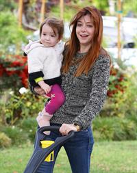 Alyson Hannigan Hangs out with her daughter in Los Angeles (November 22, 2013) 