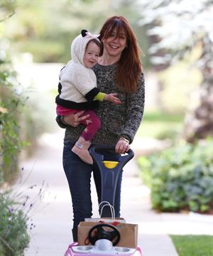Alyson Hannigan Hangs out with her daughter in Los Angeles (November 22, 2013) 