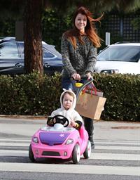 Alyson Hannigan Hangs out with her daughter in Los Angeles (November 22, 2013) 