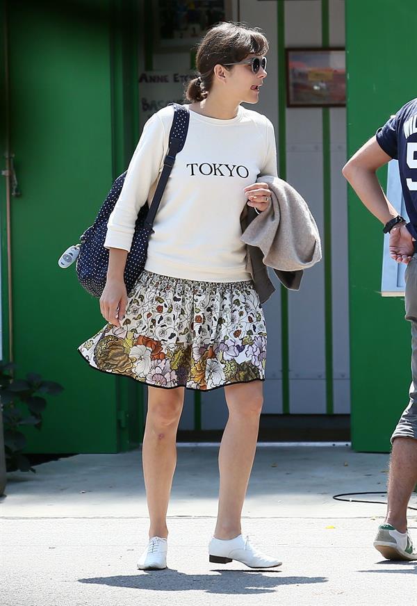 Marion Cotillard strolling down the streets of Cap-Ferret August 12, 2014
