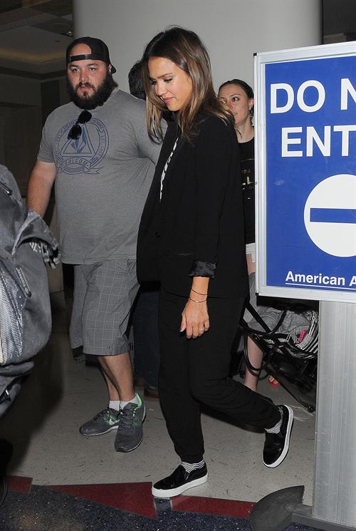 Jessica Alba arriving at LAX August 05, 2014
