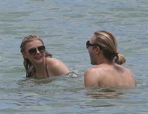 Chloe Grace Moretz candids in a Black Bikini in Miami Beach