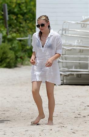 Chloe Grace Moretz candids in a Black Bikini in Miami Beach