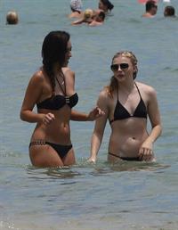 Chloe Grace Moretz candids in a Black Bikini in Miami Beach