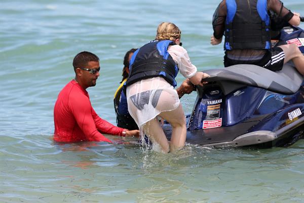 Chloe Grace Moretz candids in a Black Bikini in Miami Beach