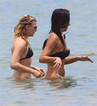Chloe Grace Moretz candids in a Black Bikini in Miami Beach