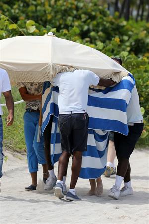Chloe Grace Moretz candids in a Black Bikini in Miami Beach