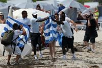 Chloe Grace Moretz candids in a Black Bikini in Miami Beach