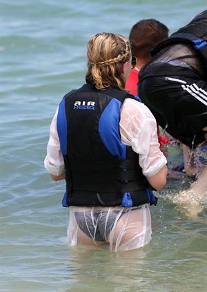 Chloe Grace Moretz candids in a Black Bikini in Miami Beach