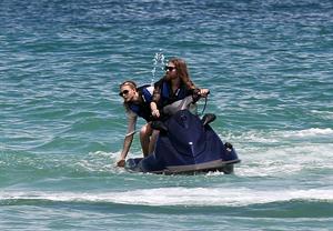 Chloe Grace Moretz candids in a Black Bikini in Miami Beach