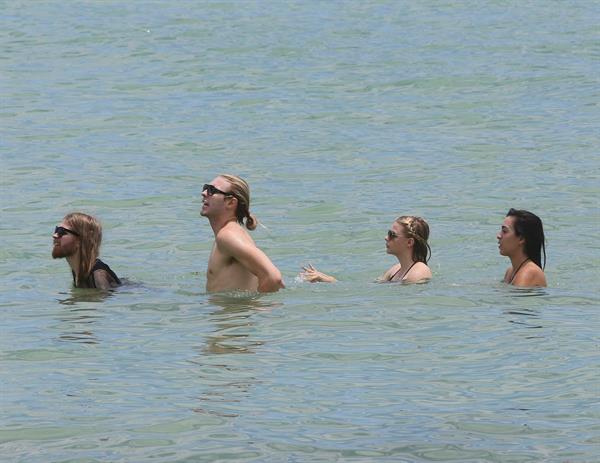 Chloe Grace Moretz candids in a Black Bikini in Miami Beach