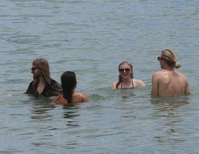 Chloe Grace Moretz candids in a Black Bikini in Miami Beach