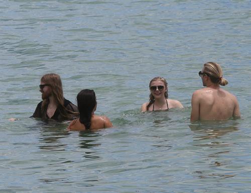 Chloe Grace Moretz candids in a Black Bikini in Miami Beach