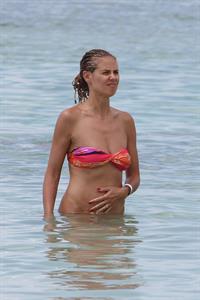 Heidi Klum wearing a bikini on a beach in the Bahamas on July 6, 2013