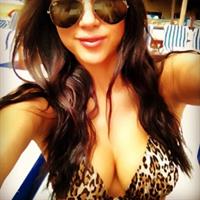 Arianny Celeste in a bikini taking a selfie