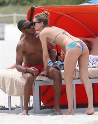 Doutzen Kroes in a bikini - ass