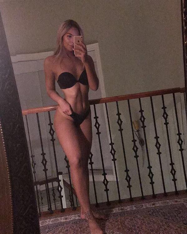 Anonymous in a bikini taking a selfie