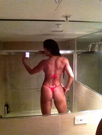 Michelle Lewin in a bikini taking a selfie