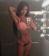 Michelle Lewin in a bikini taking a selfie