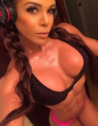 Yarishna Ayala Otero in a bikini taking a selfie