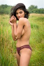 Angel Posing Naked in the Grass