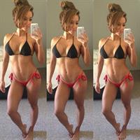 Joy Grajo in a bikini taking a selfie