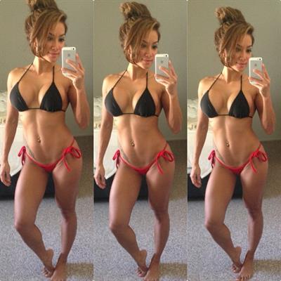 Joy Grajo in a bikini taking a selfie