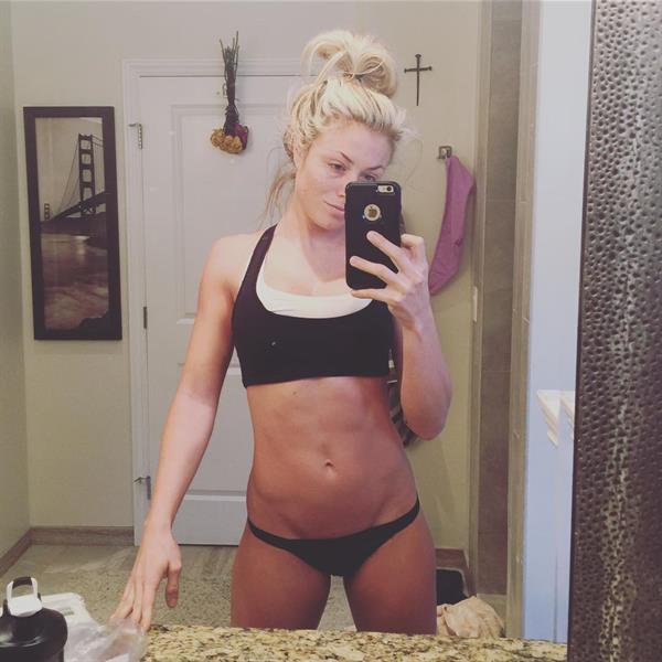 Dianna Dahlgren in a bikini taking a selfie