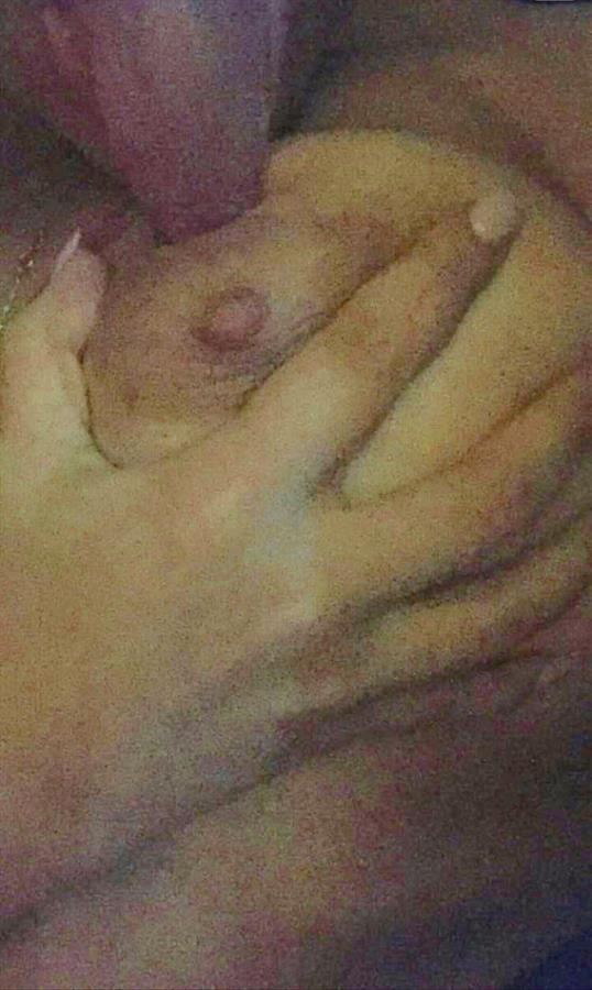 Evelyn taking a selfie and - breasts